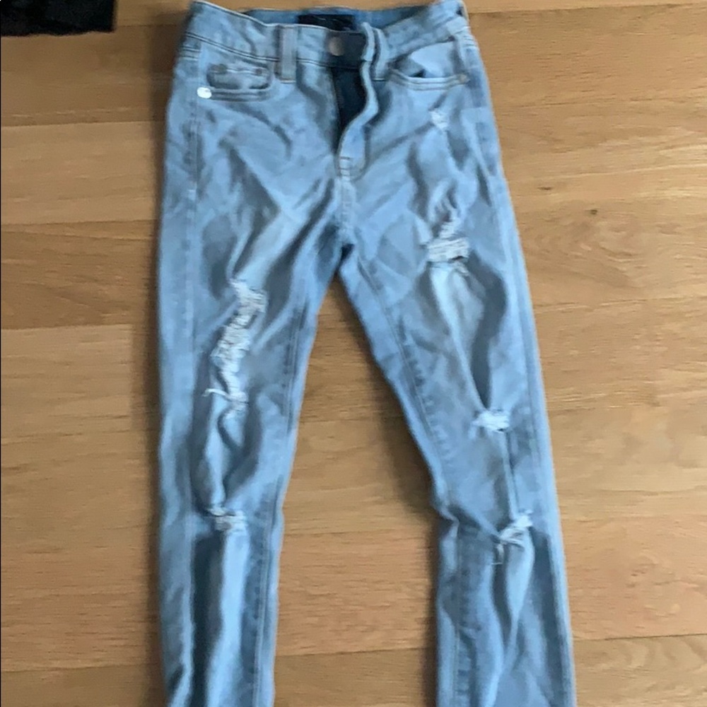 Ripped blue jeans